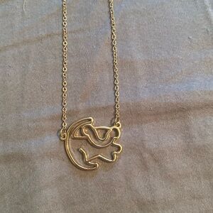 Official Disney merchandise. Gold Simba necklace. Like new condition.